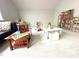 Spacious playroom with neutral carpet and plenty of space for activities at 7125 Crested Iris Pl, Durham, NC 27703