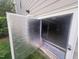 View of insulated crawlspace door with newly renovated encapsulation at 7312 Ridgeline Dr, Raleigh, NC 27613