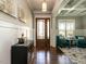Elegant foyer with hardwood floors, wainscoting, and coffered ceilings at 7312 Ridgeline Dr, Raleigh, NC 27613