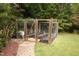 Enclosed garden area with raised planting beds, ready for gardening enthusiasts to cultivate at 7312 Ridgeline Dr, Raleigh, NC 27613