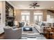 Spacious living room with a stone fireplace and ample seating at 7312 Ridgeline Dr, Raleigh, NC 27613