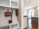 Inviting mudroom featuring custom built-ins, coat hooks, and convenient storage for organized entry at 7312 Ridgeline Dr, Raleigh, NC 27613