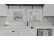 Bright kitchen with stainless steel appliances, white cabinetry, and lots of natural light at 8211 Julian Rd, Dunn, NC 28334