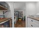 Organized walk-in pantry featuring ample shelving and storage space at 8211 Julian Rd, Dunn, NC 28334