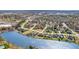 Beautiful waterfront community showcasing luxury homes with manicured lawns and lake access at 915 Dunleigh Dr, Burlington, NC 27215
