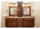 Bathroom featuring dual vanities with granite countertops, offering ample space and storage at 915 Dunleigh Dr, Burlington, NC 27215