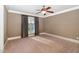 Carpeted bedroom featuring a window and neutral walls, offering a comfortable and versatile space at 915 Dunleigh Dr, Burlington, NC 27215