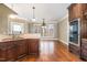 Bright eat-in kitchen with stainless appliances, adjacent to the dining area at 915 Dunleigh Dr, Burlington, NC 27215