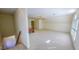 Large bonus room with plenty of space and natural light from a window at 98 Lochridge Dr, Roxboro, NC 27573