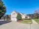 Spacious home with attached two-car garage and mature landscaping at 98 Lochridge Dr, Roxboro, NC 27573