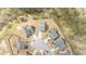Aerial view of a cul-de-sac neighborhood featuring modern homes with well-manicured lawns at 104 Chaseford Ct, Holly Springs, NC 27540