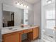 Large bathroom with lots of counterspace and lots of light at 105 Damask Rose Dr, Holly Springs, NC 27540
