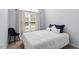 A minimalistic bedroom with white walls and carpet at 105 Damask Rose Dr, Holly Springs, NC 27540