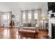 Inviting living room boasting hardwood floors, neutral tones, and a fireplace at 105 Damask Rose Dr, Holly Springs, NC 27540
