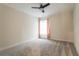 Bedroom featuring soft neutral carpet with a single window with bright natural light at 1102 Dartmouth Dr, Mebane, NC 27302