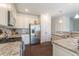 Well-equipped kitchen featuring stainless steel appliances and granite countertops at 1102 Dartmouth Dr, Mebane, NC 27302