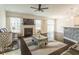 Open concept living room with fireplace, access to the kitchen and backyard at 1102 Dartmouth Dr, Mebane, NC 27302