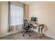 Bright home office featuring a large window allowing for plenty of natural light at 1102 Dartmouth Dr, Mebane, NC 27302