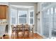 Sunny breakfast nook features a bay window and access to a covered porch at 11129 Bayberry Hills Dr, Raleigh, NC 27617