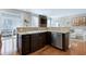 Kitchen featuring an island, breakfast bar, and stainless steel appliances at 11129 Bayberry Hills Dr, Raleigh, NC 27617
