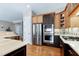 Gourmet kitchen with stainless steel appliances and custom cabinets at 11129 Bayberry Hills Dr, Raleigh, NC 27617