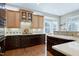 Gourmet kitchen with custom cabinets and stainless steel appliances at 11129 Bayberry Hills Dr, Raleigh, NC 27617
