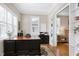 Home office features a large desk and lots of natural light at 11129 Bayberry Hills Dr, Raleigh, NC 27617