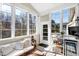 Bright sunroom with multiple windows and an outdoor view at 11129 Bayberry Hills Dr, Raleigh, NC 27617