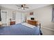 Bright bedroom featuring carpet, closet space and a connected bathroom with shower at 1208 Briarcliff Rd, Burlington, NC 27215