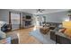 Cozy living room with fireplace, hardwood floors and natural light at 1208 Briarcliff Rd, Burlington, NC 27215