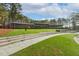 Exterior view of amphitheater steps leading to the lawn at 121 Highclere Ln, Cary, NC 27518