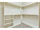 Large walk-in closet with custom shelving and ample storage space at 121 Highclere Ln, Cary, NC 27518