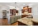 Spacious kitchen featuring two islands, stainless steel appliances, and custom cabinets at 121 Highclere Ln, Cary, NC 27518