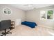 Bedroom with a bed and desk, offering a comfortable and functional living space at 124 Ripley Ct, Cary, NC 27513
