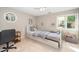 bedroom with a bed, desk, and toy storage, creating a neat and organized space at 124 Ripley Ct, Cary, NC 27513