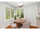 Breakfast nook featuring a round table, four chairs, and a large window with a view at 124 Ripley Ct, Cary, NC 27513