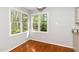 Breakfast nook features hardwood floors and natural light from a large window with a view of the outdoors at 124 Ripley Ct, Cary, NC 27513