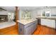 Open kitchen featuring granite countertops, stainless steel sink, and a kitchen island with a view at 124 Ripley Ct, Cary, NC 27513