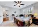Bedroom featuring a window, a wooden bed, a desk, and carpet at 1308 Helmsdale Dr, Cary, NC 27511