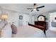 Bedroom featuring closet space, natural light, and a full bath at 1308 Helmsdale Dr, Cary, NC 27511