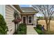 Inviting home entrance with flower baskets and well-maintained landscaping at 1404 Palmer Hill Dr, Durham, NC 27703