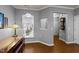 Home office featuring wood floors, a window, and stylish Tiffany-style lamp at 1404 Palmer Hill Dr, Durham, NC 27703
