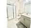 Modern bathroom features walk-in shower, toilet and vanity with sink and mirror at 1415 Dalton Pl, Mebane, NC 27302