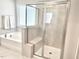 Bright bathroom with a tub and separate glass-enclosed shower providing options for relaxation and convenience at 1415 Dalton Pl, Mebane, NC 27302