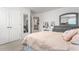 Bedroom featuring gray furniture set, carpeted floors and a light pink comforter on the bed at 1415 Dalton Pl, Mebane, NC 27302