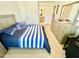 Cozy bedroom featuring a bed, dresser, and carpeted floor at 1415 Dalton Pl, Mebane, NC 27302
