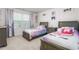 bedroom featuring coordinated furniture, decor, and natural light at 1415 Dalton Pl, Mebane, NC 27302