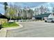 Fenced-in community pool with pool house and parking lot at 1415 Dalton Pl, Mebane, NC 27302