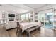 Open living room flows to deck with stylish furniture and bright, natural light at 1415 Dalton Pl, Mebane, NC 27302