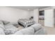 Inviting living room featuring a sectional, bed, TV, and neutral decor at 1415 Dalton Pl, Mebane, NC 27302
